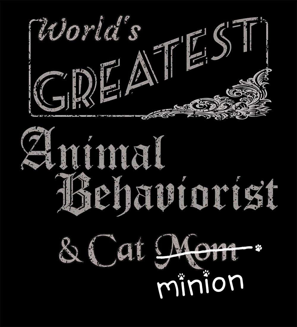 Close up of design that reads, "World's Greatest Animal Behaviorist and Cat Mom" - Mom is crossed out and "minion" is handwritten below surrounded by a few cat paws.