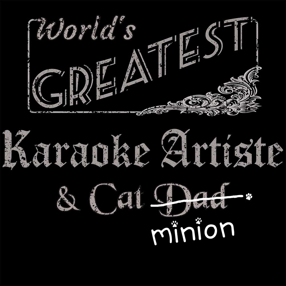 Close up of design that reads, "World's Greatest Karaoke Artiste and Cat Dad" - Dad is crossed out and "minion" is handwritten below surrounded by a few cat paws.