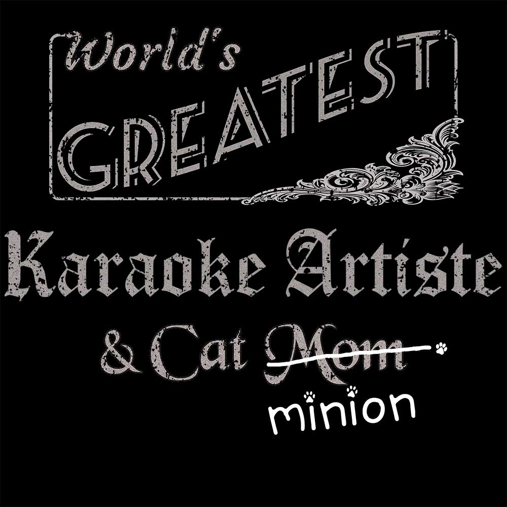 Close up of design that reads, "World's Greatest Karaoke Artiste and Cat Mom" - Mom is crossed out and "minion" is handwritten below surrounded by a few cat paws.