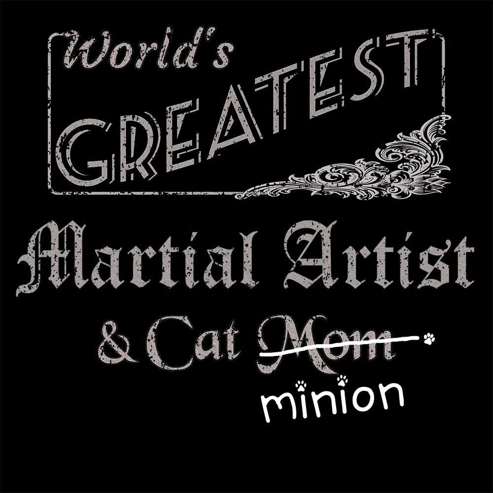 Close up of design that reads, "World's Greatest Martial Artist and Cat Mom" - Mom is crossed out and "minion" is handwritten below surrounded by a few cat paws.